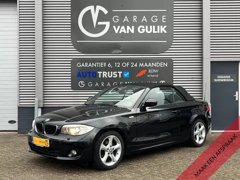 BMW 1 Serie Cabrio 118i 143PK High Executive Automaat,Clima,Cruise,Navi,Leder,Windscherm,Stoelverw.,Xenon,Pdc,Isofix,Lmv,Mistlampen,Bluetooth,Cabrio,Stuurb.,KeylessGo,