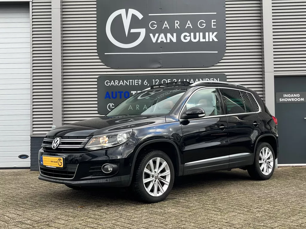 Volkswagen Tiguan 1.4 TSI 160PK Sport&amp;Style Clima,Cruise,Navi,Leder,Stoelverw.,Panoramadak,Aux,Isofix,Stuurb.,Pdc,Lmv,