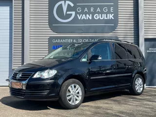 Volkswagen Touran 1.6 102PK Comfortline Business 7pers Clima,Cruise,Trekhaak,Pdc,Navi,Isofix,Stuurb.,GetintGlas,Dakrail,Lmv,Armst.